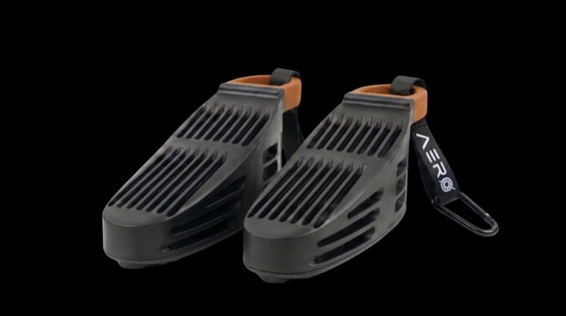 A pair of AERØ units in grey with copper straps